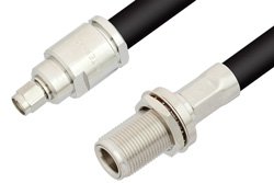PE34185LF - SMA Male to N Female Bulkhead Cable Using RG213 Coax, RoHS
