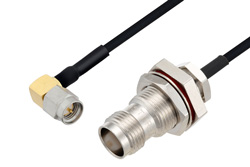 PE3W03175/HS - SMA Male Right Angle to TNC Female Bulkhead Cable Using PE-SR405FLJ Coax with HeatShrink